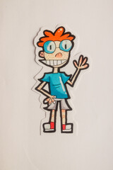 Images of a funny fictional character for a cartoon or comic on paper drawn with a marker