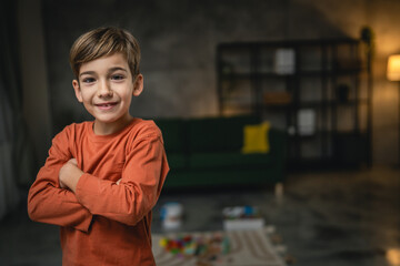 One boy caucasian child seven years old kid at home schoolboy portrait