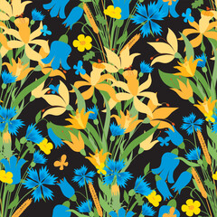 Seamless pattern of blossoming blue bells,cornflowers, yellow daffodils and flying butterflies