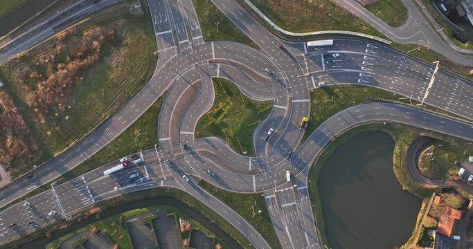 Turbo traffic square roundabout, Westerleeplein in Maasdijk. Aerial drone view. Complex intersection.