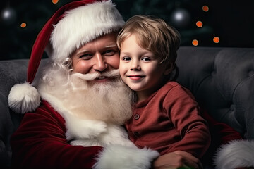 On backdrop of Christmas tree Santa Claus lovingly embraces cheerful little boy on his lap celebrating winter holidays with kids.