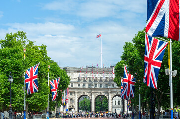 Admiralty Arch with Union Jack flags marking Queen Elizabeth II Platinum Jubilee on 3 June 2022,...