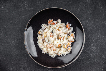 risotto seafood rice second course fresh delicious healthy eating cooking appetizer meal food snack on the table