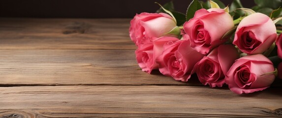 Fototapeta na wymiar valentines day red roses on wood background