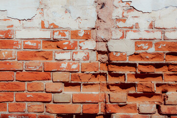 The wall is made of red brick locally painted white. Covered with white plaster. Free space for an...