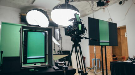 Film set, monitors and modern shooting equipment.