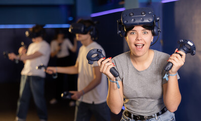 Portrait of a cheerful girl after playing a virtual game - surprise and delight