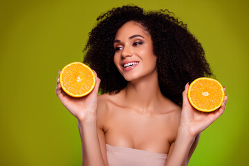 Photo of stunning gorgeous lady hold citrus advertise eco beauty product for tender gentle skin on...