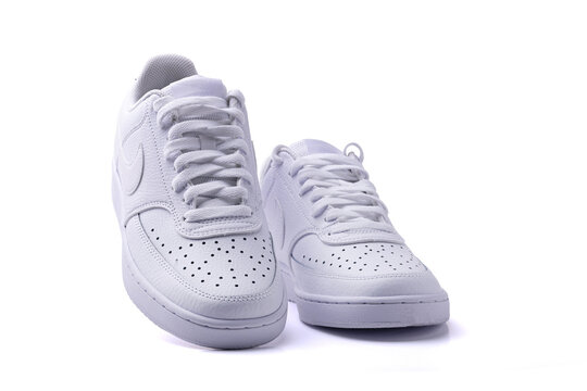 Pair of White Nike sneakers on white background, sports fashion, walking shoes, sneakers, lifestyle, product photography