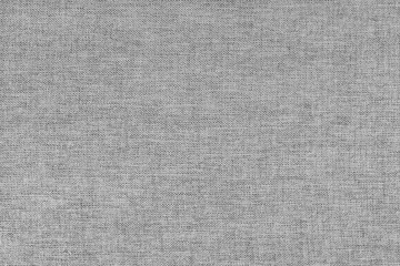 Textile background, gray coarse fabric texture, cloth structure close up, jacquard woven upholstery, furniture textile material, wallpaper, backdrop..