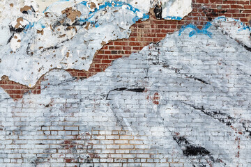 Blue and White Peeling Paint on a Red Brick Wall in Downtown Memphis Tennessee