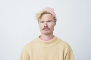Trendy Young Man with Mustache in Pink Beanie and Yellow Sweater. Generative AI.