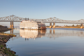 A Paddle Wheeler Cruise Ship Reflected in Front of the John R Junkin Drive Bridge over the...
