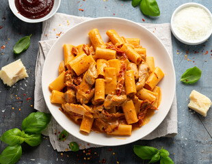 Gochujang Pasta with chicken, sun dried tomatoes and pecorino cheese.