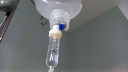 Drip infusion fluid in hospital room. Medical Concept, emergency medicine and chemotherapy treatment infusion drug injection.