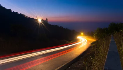 Papier Peint photo autocollant Autoroute dans la nuit Car light trails on the road at night.