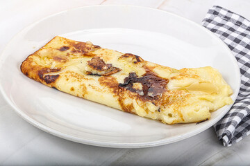 Sweet pancake with banana and honey
