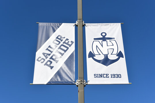 NEWPORT BEACH, CALIFORNIA - 17 DEC 2023: Banners At Newport Harbor High School, With Slogan Sailor Pride.