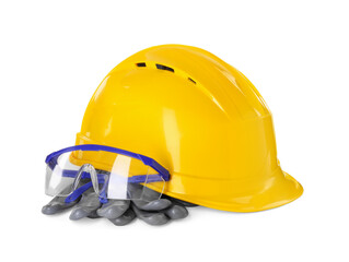 Hard hat, goggles and gloves isolated on white. Safety equipment