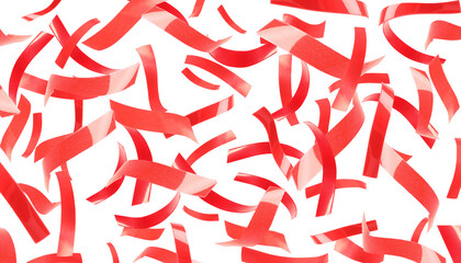 Bright red confetti falling on white background