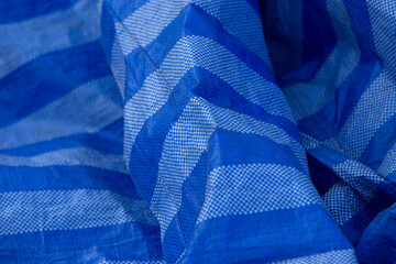 blue and white crumpled plastic as an abstract background. texture