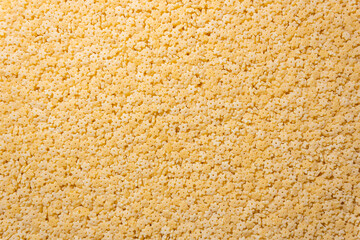 Uncooked Stelline Pasta: A Culinary Canvas of Stelline Macaroni, Creating a Lively and Textured Background for Gourmet Cooking. Dry Pasta. Raw Macaroni - Top View, Flat Lay