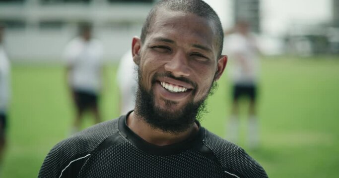 Sports, smile and portrait of man on field for game, competition or morning exercise at club. Confidence, pride and face of professional rugby player on pitch for team fitness, challenge or workout.
