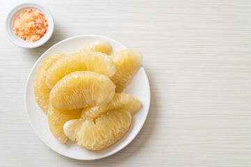 Fresh peeled pomelo, grapefruit or shaddock