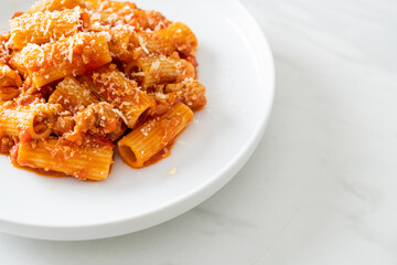 Rigatoni pasta bolognese with cheese