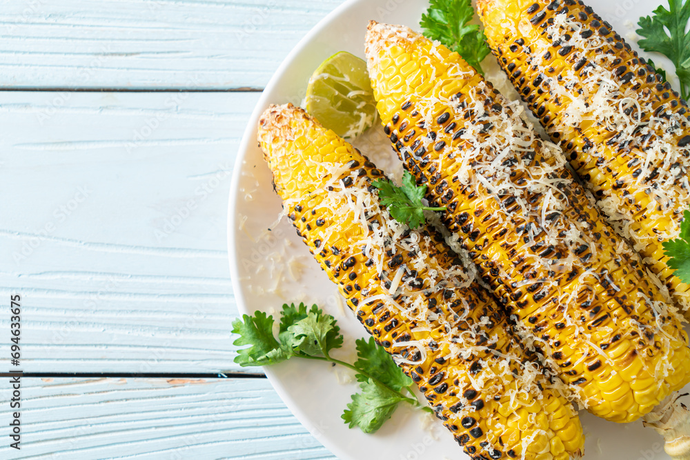 Wall mural barbecue and grilled corn with cheese and lime