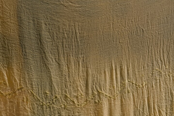 an wet cloth kept in sunlight for drying