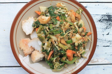 Indonesian food called lotek are on the table