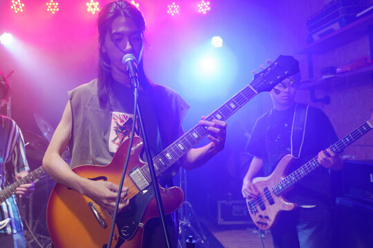 Young band performing on stage