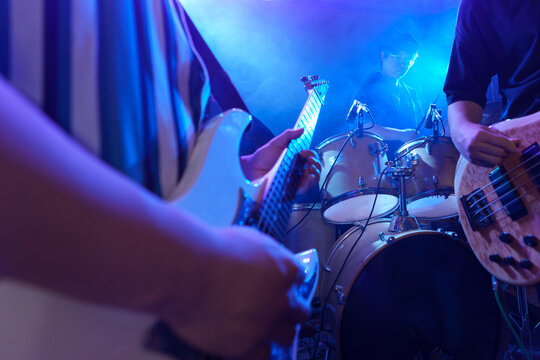 Young band performing on stage