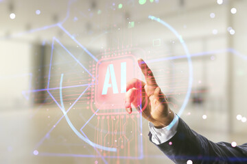 Double exposure of businessman hand working with creative artificial Intelligence abbreviation...