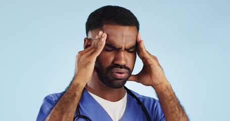 Doctor, dizzy or man in studio with headache, head pain or fatigue in medical healthcare crisis or...