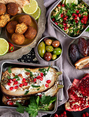 Middle eastern or Arabic different dishes on black background. Tasty traditional food concept