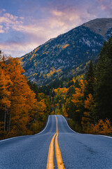 Colorado Back Country Road Through Fall Colors Towards Mountain