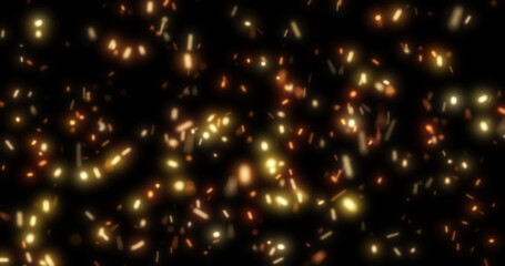 Obraz premium Abstract bright background of flying yellow glowing orange fire sparks from a fire on a black background