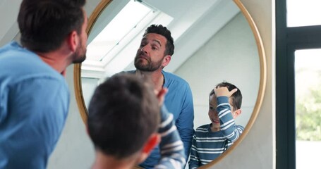 Hair, bathroom mirror and a father and child at home for hairstyle, imitate or self care. A happy man and a boy kid together in a family house for grooming, hygiene or happiness motivation in morning