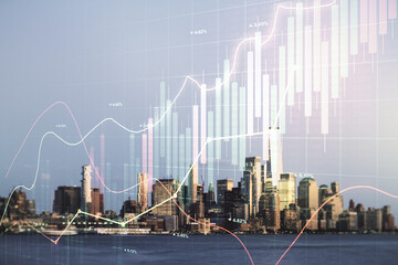 Multi exposure of abstract virtual financial graph hologram on New York skyline background, forex and investment concept