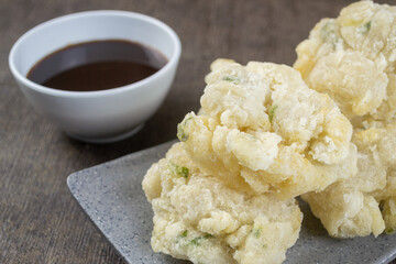 Cireng bumbu rujak. indonesian food made from tapioca flour is given spices such as garlic, salt, pepper and is cooked by frying.