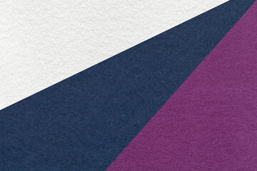 Texture of old craft white, navy blue and purple color paper background, macro. Vintage abstract...