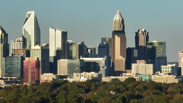 Panoramic view of Charlotte skyline during sunset. Aerial establishing shot of Charlotte, North Carolina.