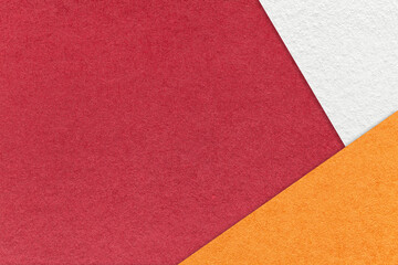 Fototapeta premium Texture of craft red color paper background with white and orange border. Vintage abstract wine cardboard.
