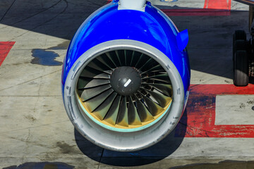 Close up of an airplane engine of a passenger aircraft parked at a gate in San Francisco...