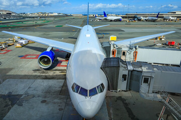 Passenger aircraft parked at the gate, waiting to be loaded at the San Francisco International...