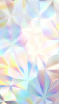 Vertical video footage, slow motion soft focus holographic iridescent background. Abstract calm colorful video cover. Multicolor low poly effect wallpaper. Best for intro, opener, cover presentation