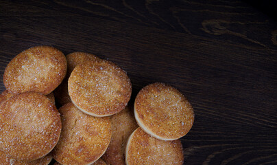 Beautiful round cookies on a wooden board. A few cookies. A bunch of cookies.