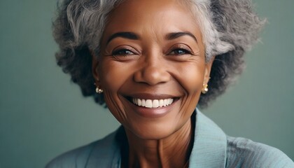Beautiful gorgeous 50s mid age beautiful elderly senior model woman with grey hair laughing and smiling.